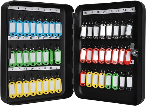 Black metal wall mount key storage box with 48 numbered slots, including green and red keychains, on a light gray surface.