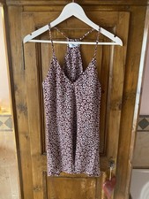 I’Am Top con spalle scoperte in viscosa bordeaux a fiorellini bianchi.Taglia S