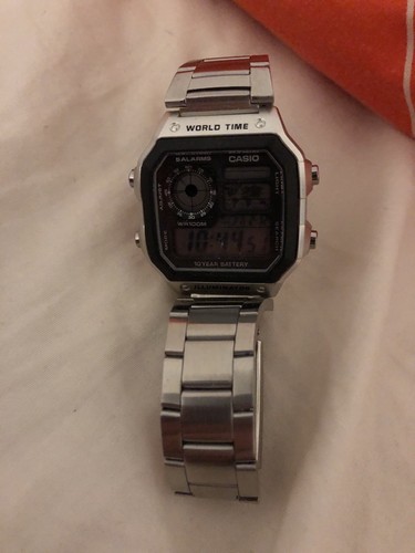 casio world time illuminator wr100m alarms square model