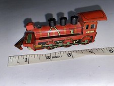 antique vintage tin toy locomotive train red