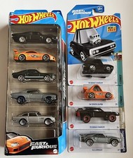 Hot Wheels Fast & Furious Paquete de 5 + Supra Tooned y Cargador, Cargador 70, Hielo Nuevo