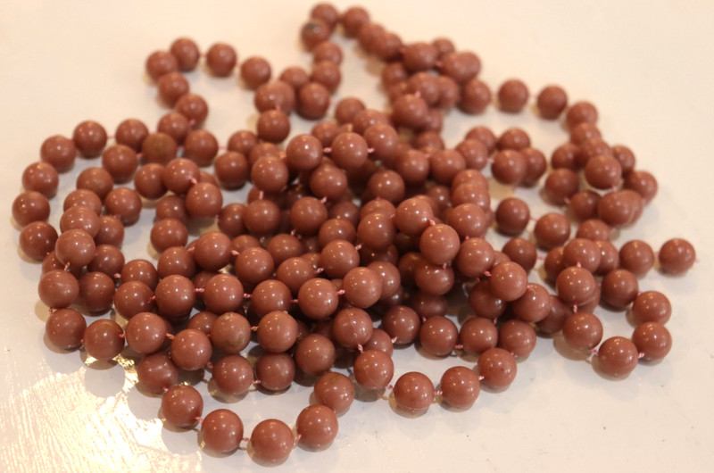 Wooden Beaded 7’ Garland Pink in Color