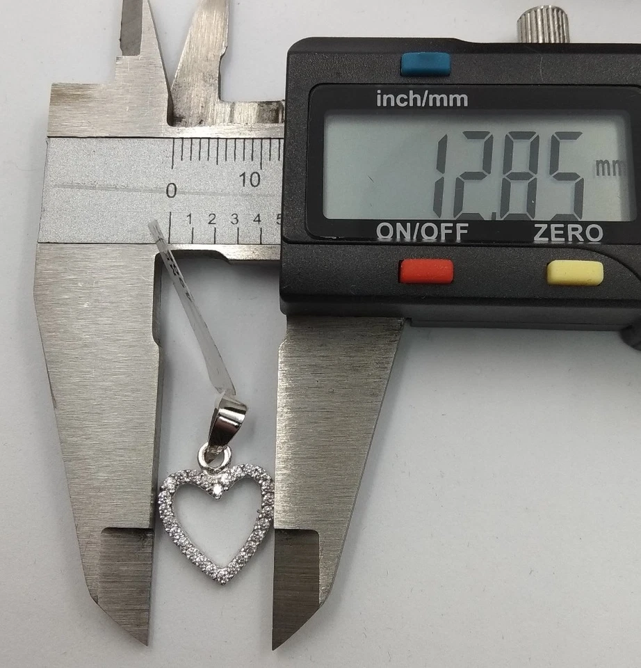 Colgante oro blanco 18k 750 m. Reversible, 2 lados: zafiros azules y circonitas - Imagen 3 de 4