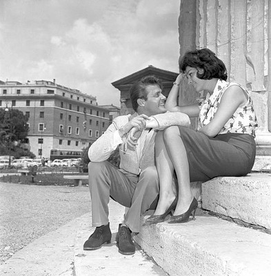 Roger Moore and Luisa Mattioli having a break from the shooting of- Old Photo