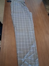 Men's woven pajama pantsMaterial: 100 cottonFeatures: Elastic waist, drawstring