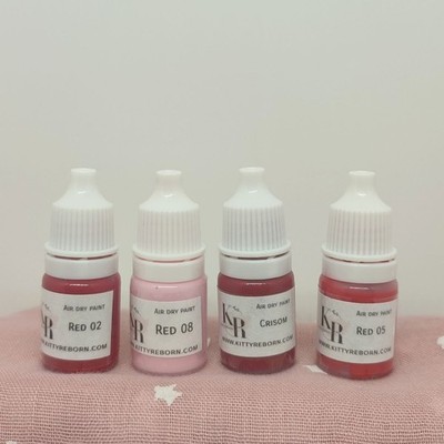 Set tonos Rojos secado al aire bebe reborn