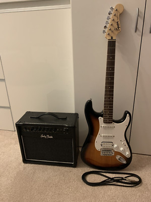 Gitarre von Squier Stratocaster und Verstärker von Harley Benton HB-20R