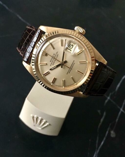 rolex with brown leather band