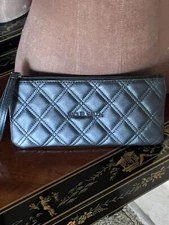 Raquel Welch Black Wallet Wristlet Logo, sig. diamond quilting, front flap snap.