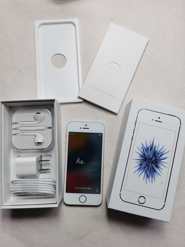 99% N ew Apple iPhone SE 1st generation - 64GB - Silver (Unlocked)  (CDMA + GSM) - Picture 1 of 10