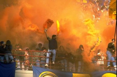 Supporters of Inter Milan cheer on their team at a match at the Sa- Old Photo