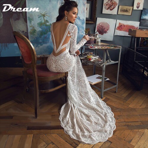 Abito da sposa a sirena pizzo scollo a V profondo senza schiena maniche lunghe spazzata treno boho - Foto 9 di 17