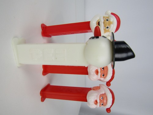 PEZ Christmas 4 Santa Claus and 1 Frosty Snowmen PEZ Candy Dispenser w/ Feet - Picture 7 of 8