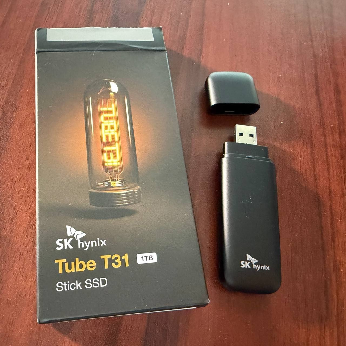 SK Hynix Tube T31 1TB Stick Type USB Portable SSD 1 TB - in Open 