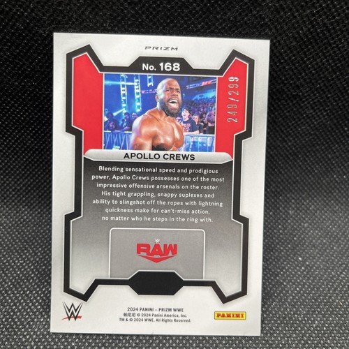 2024 Panini Prizm WWE Prizms Red #168 Apollo Crews /299 - Picture 2 of 2
