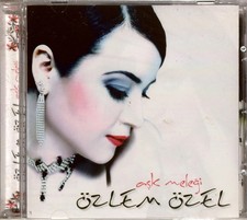 13534--Özlem Özel Ask Melegi 1.Baski Jelatinli