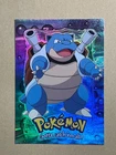 1999 Topps Pokemon the First Movie Rainbow Foil E9 #09 Blastoise Blue Logo NM-