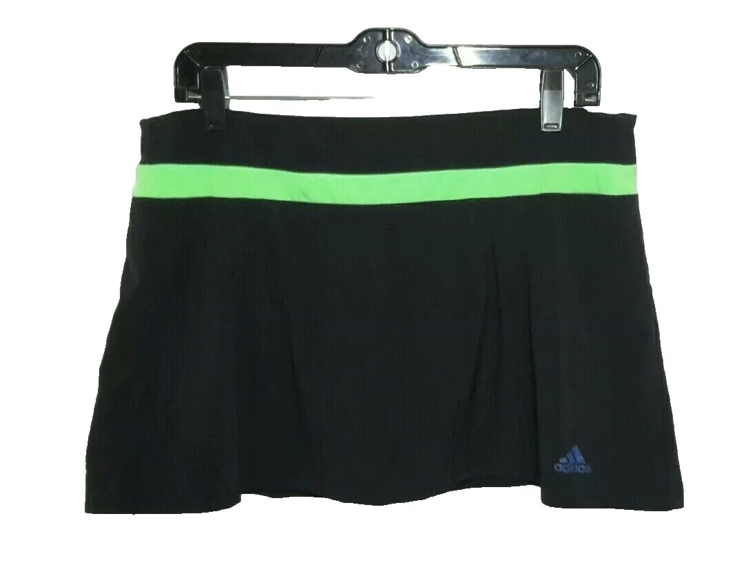 Adidas Women's Multi-color ropa de tenis y deportes con Raqueta