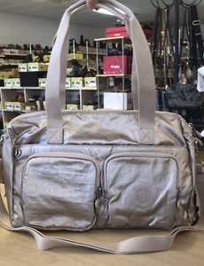 kipling front pocket satchel