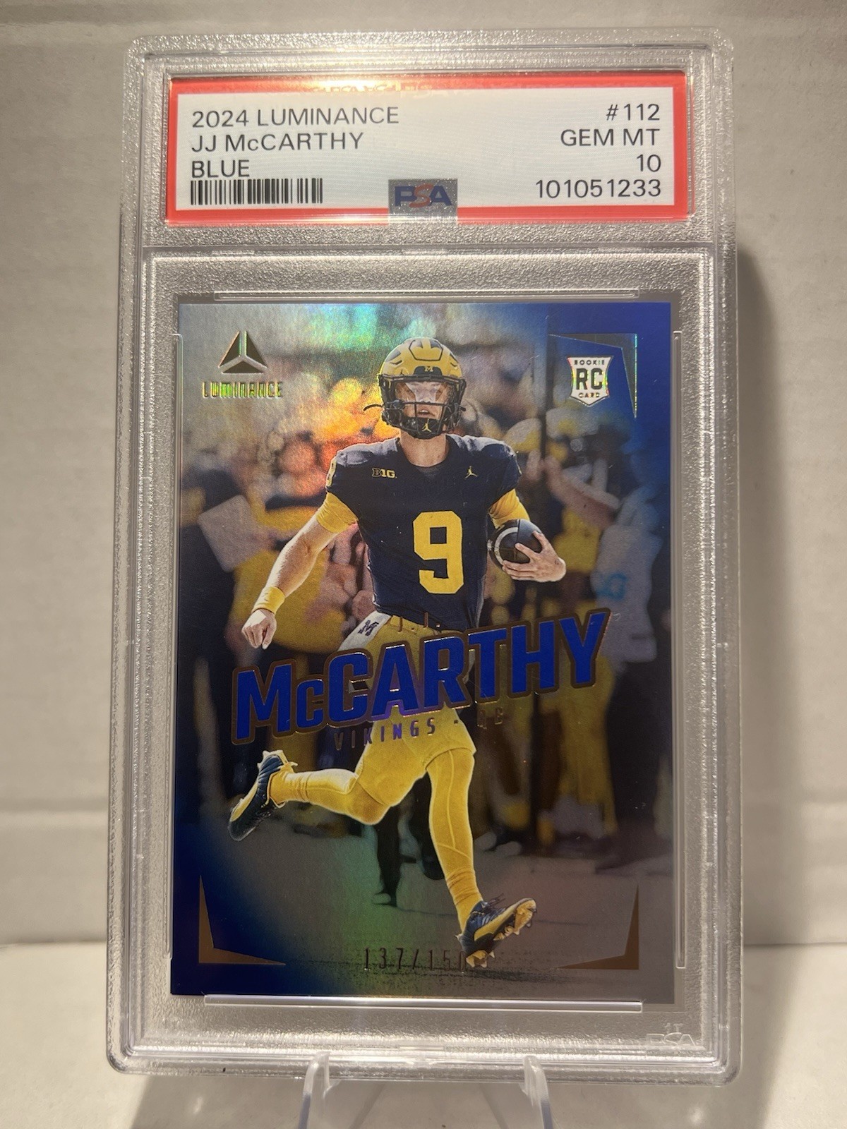 2024 Panini Luminance - Rookies J.J. McCarthy #112 Blue /150 (RC) PSA 10