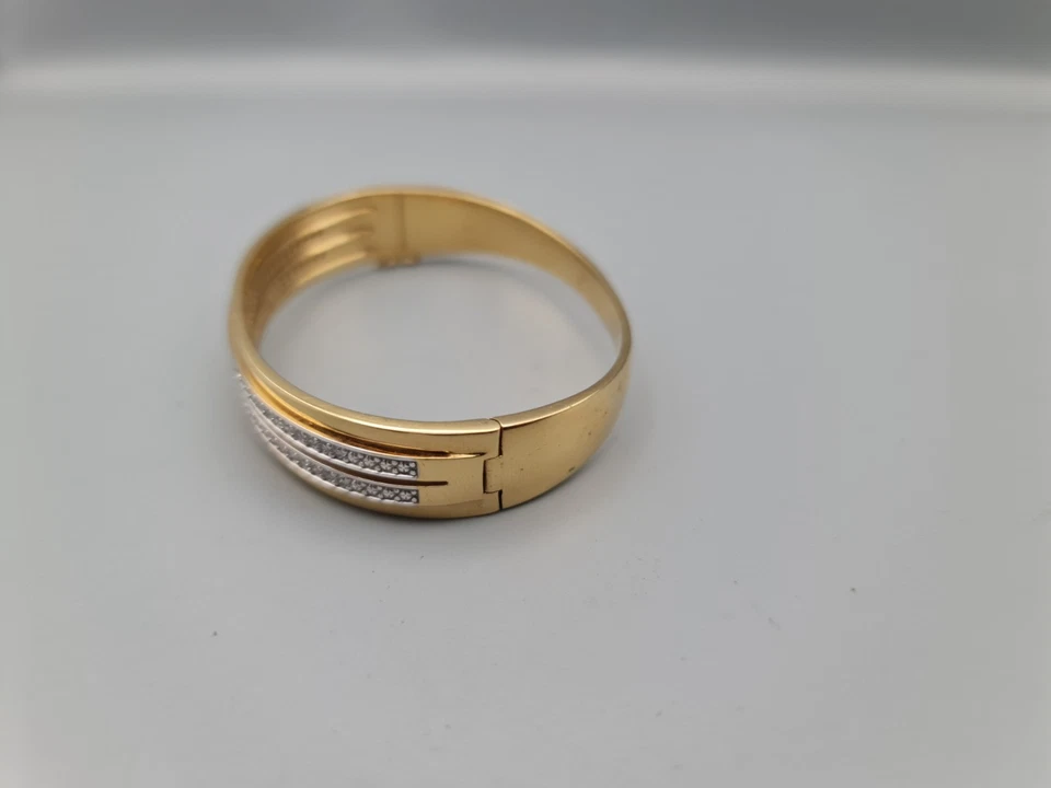 Eleganter, mehrreihiger Armreif mit funkelndem Strass in edler Goldfarbe. - Bild 3 von 4