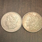1904 O and 1904 Morgan Silver Dollar  $1 Uncertified 90% Silver (0.9 Fineness) 2