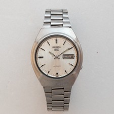 Vintage Seiko 5 Automatic 7009-8760 Silver Pinstripe Dial 17J Cushion Case Watch