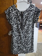 Black and white Rose mini dress size small-medium back zipper, front pocket