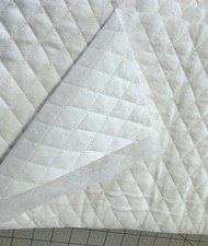 Quilted Diamond Pattern White Cotton Fabric Doublesided Poly Batting 1 7/8 yd.