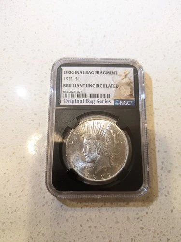 1922 Brilliant Uncirculated (BU) Peace Dollar with Bag Fragment NGC Certified