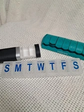 Lot of 3 pill holders, one is a hide away holder, very cool, all work great FED