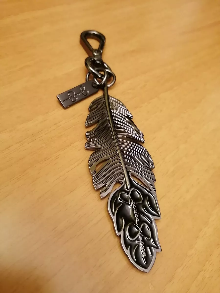 Feather bag best sale charm