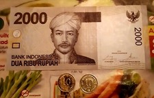 1 Banknote aus Indonesien 2000 Rupiah UNC. 2 Münzen aus Hongkong. Gebraucht.