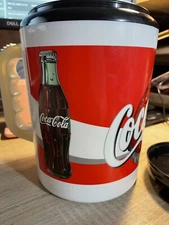 Vintage Coca Cola Travel Mug 52.oz. white and red with black lid 
