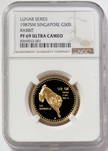 1987 GOLD SINGAPORE 50 SINGOLD 1/2 OZ YEAR OF RABBIT COIN NGC PROOF 69 UC
