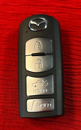 TESTED OEM MAZDA KEY FOB fcc WAZSKE13D01 ic 662F-SK13D01 model SKE13D-01 - product listing photo