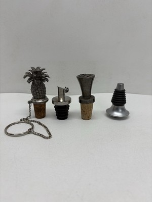 Set Of Four Wine Stopper & One Is A Pewter Pineapple Wine Stopper With Chain
