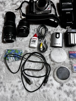 Canon EOS Rebel Camera DS6041 Digital Camera with a zoom lense and much more