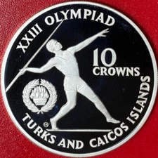1984 TURKS CAICOS 10 CROWNS .69 OZ SILVER GEM PROOF OLYMPIC JAVELIN THROWER
