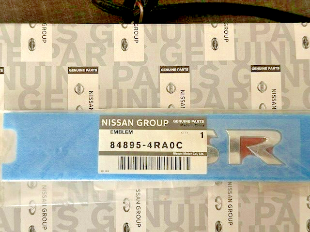New OEM Nissan Maxima 2016-2022 Deck Lid Emblem “SR” 84895-4RA0C