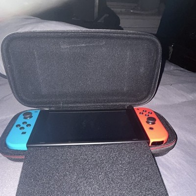 Nintendo Switch Console HAC-001 w/ Neon Red/Neon Blue Joy-Con & Carrying Case