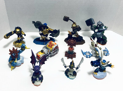 Mixed bundled lot of 11 Skylanders Activision Toy action figures & Vehicles