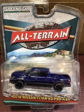 Greenlight All-Terrain series 12.  2018 Nissan Titan XD Pro-4X.     Blue