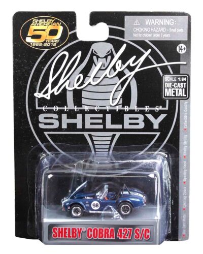 Shelby Collectibles 1/64 Shelby Cobra 427 S/C #98 blu con righe bianche - Foto 1 di 1