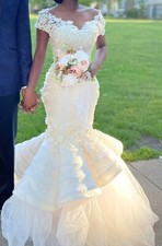 Wedding Dress size 4 used (custom made dress by TUBO)