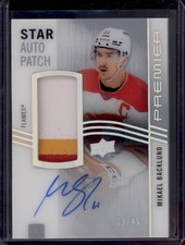 2023-24 Premier Mikael Backlund Star Auto Patch 3-Color SSP /49