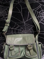 vintige marc jacob’s purse/pale green with denim/red pattern on the insides.