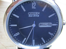 Citizen Eco-Drive men's wristwatch day/date original signed leather band runs