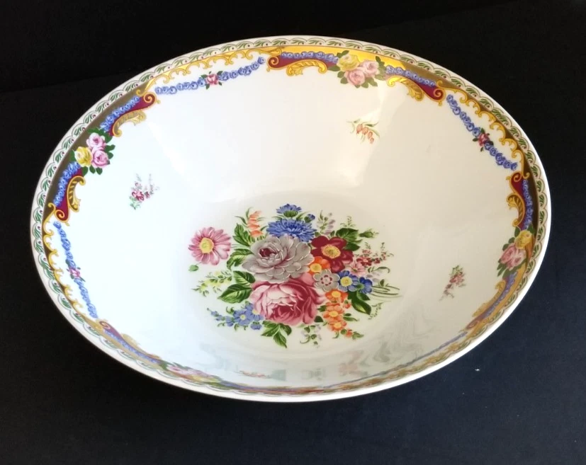 4 anciennes soucoupes en porcelaine de Limoges à décor de fleurs roses