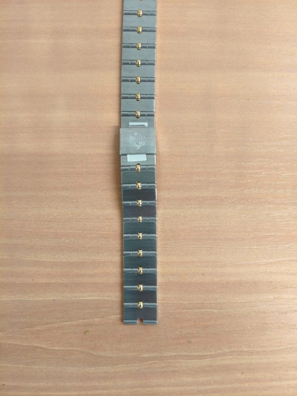 Bracelet en acier et or pour montre Van Cleef Arpels maillons luxe